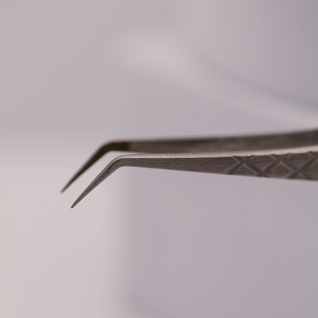 Angled Fibre Grip Volume Tweezers