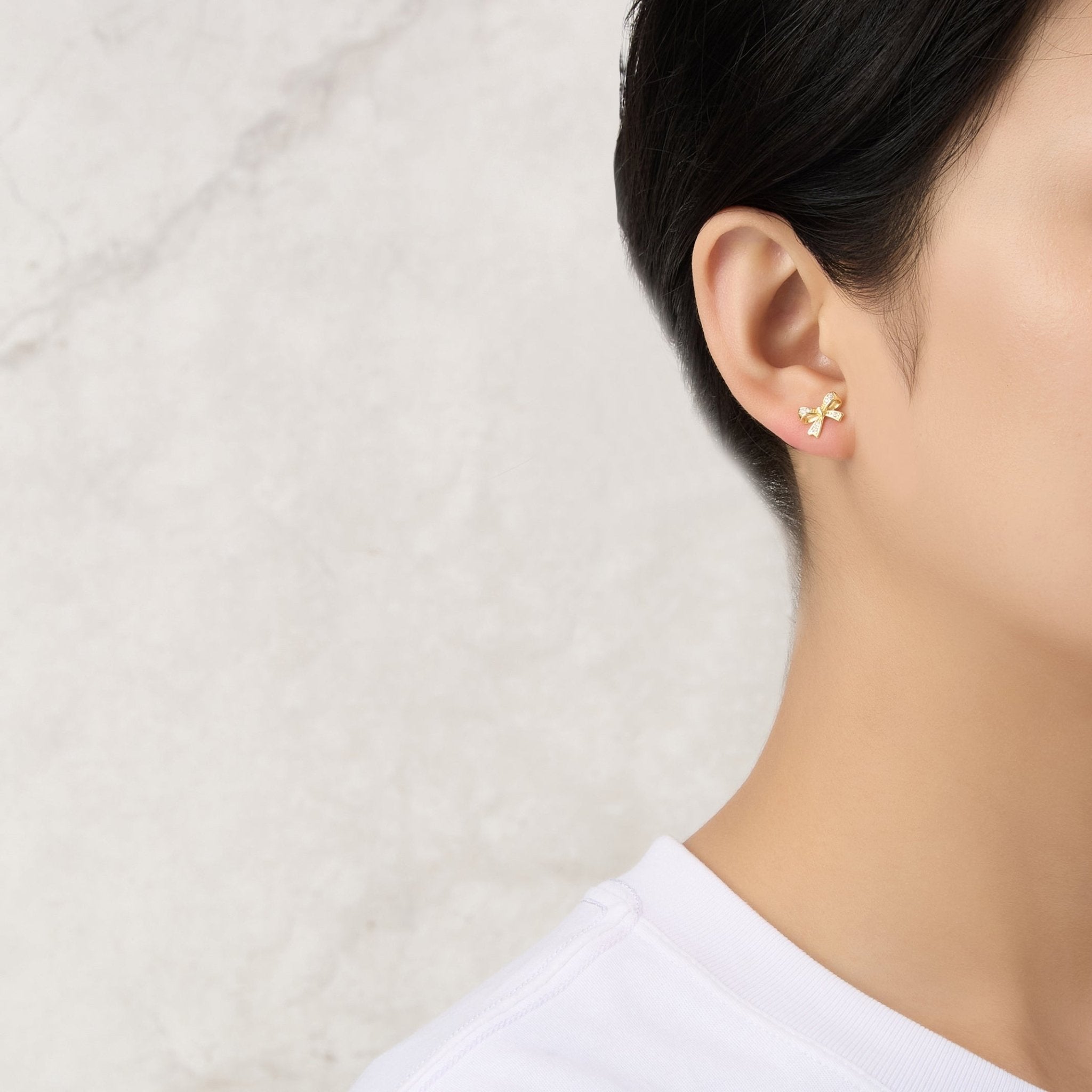 18k Gold Plated Bow Earrings Created with Zircondia® Crystals