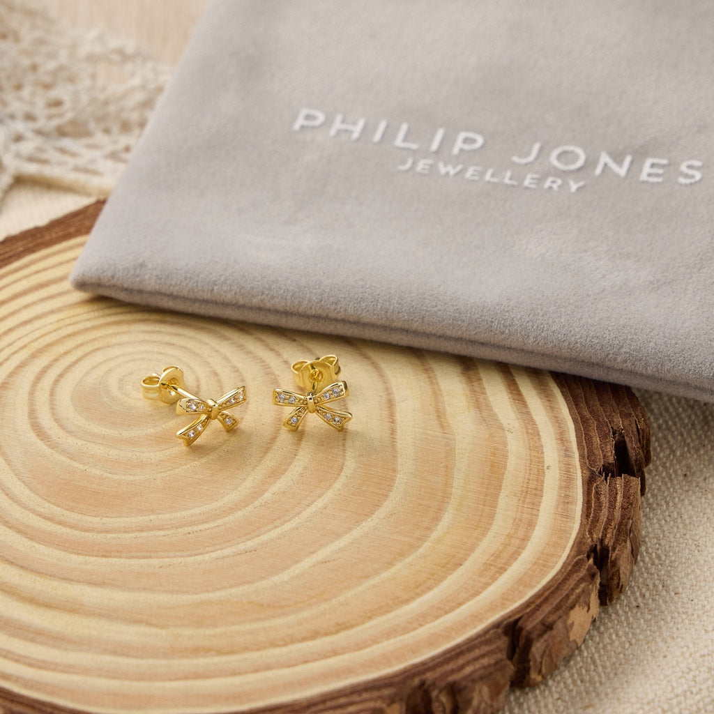 18k Gold Plated Bow Earrings Created with Zircondia® Crystals