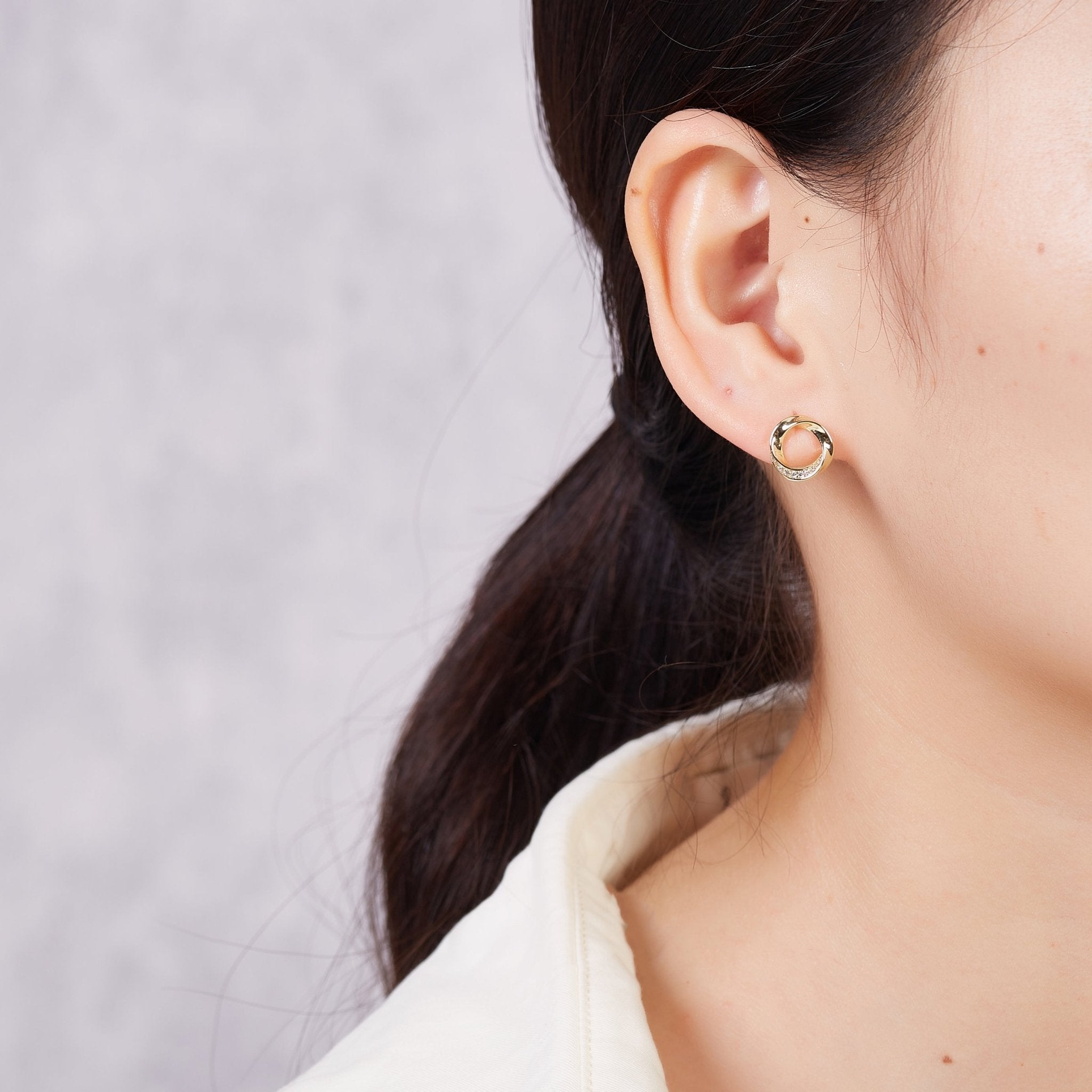 18k Gold Plated Circle Twist Earrings Created with Zircondia® Crystals