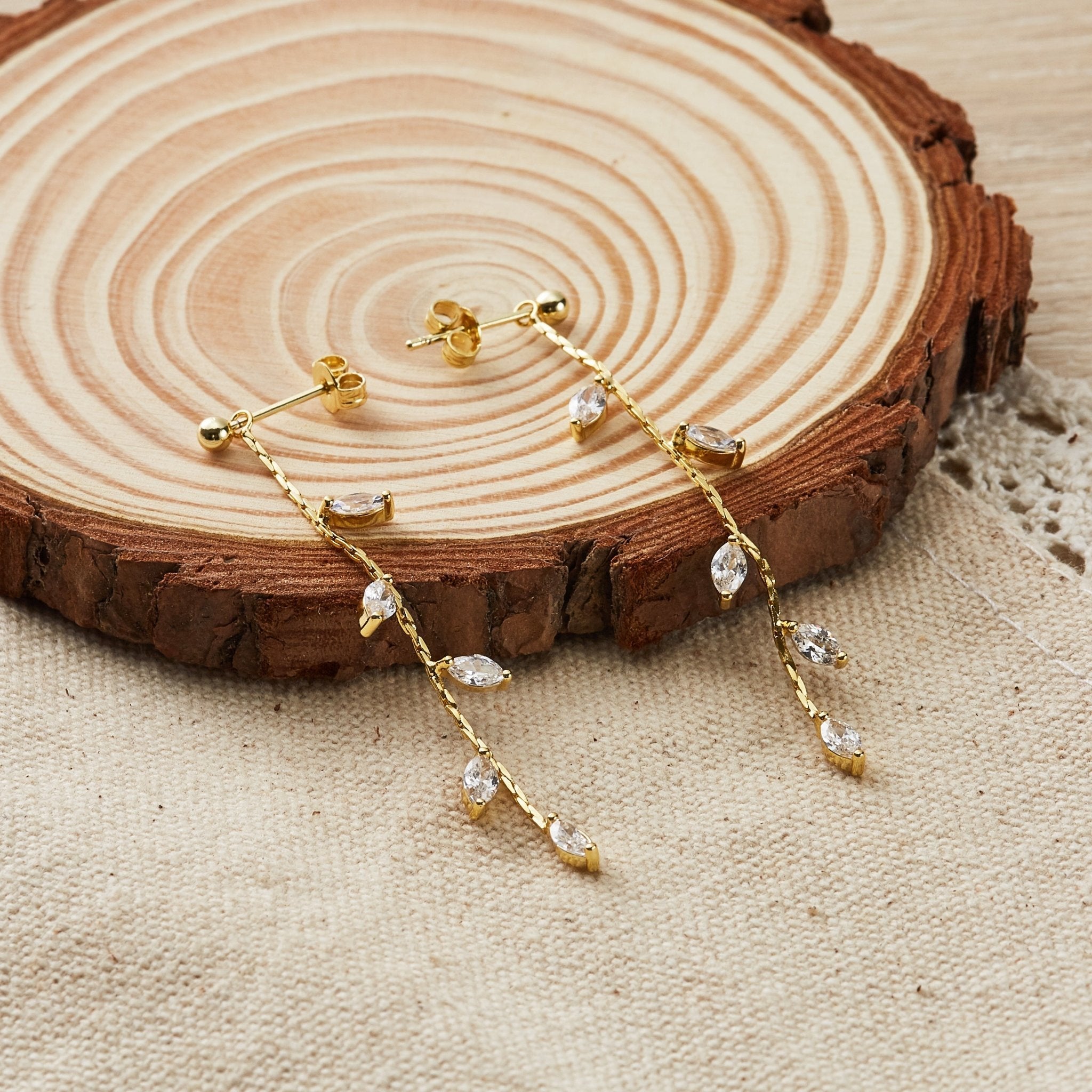 18k Gold Plated Leaf Dangle Earrings Created with Zircondia® Crystals