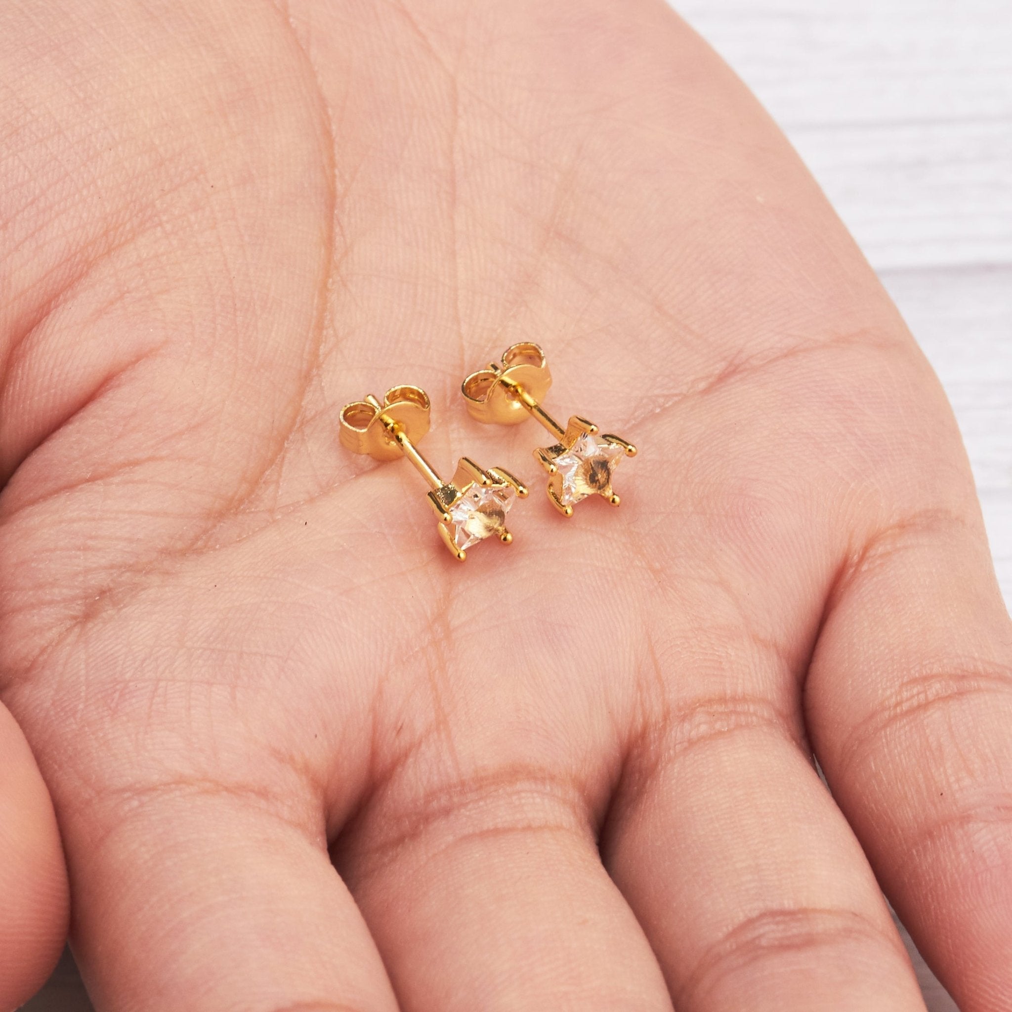 18k Gold Plated Star Earrings Created with Zircondia® Crystals