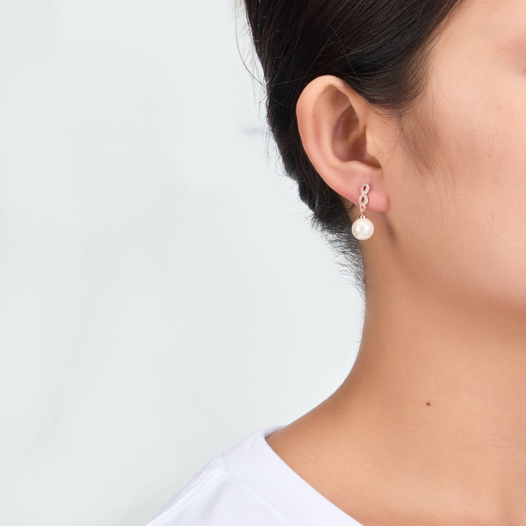 Rose Gold Plated Infinity Pearl Drop Earrings Created with Zircondia® Crystals