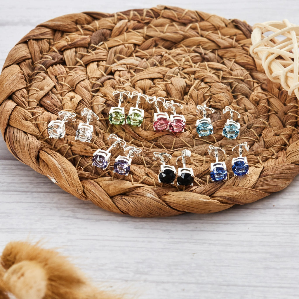 Seven Pack of Solitaire Earrings Created with Zircondia® Crystals