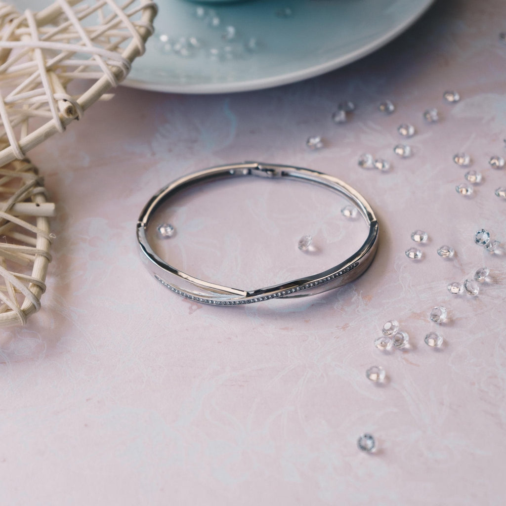 Silver Plated Arc Bangle Created with Zircondia® Crystals (7 Inch)