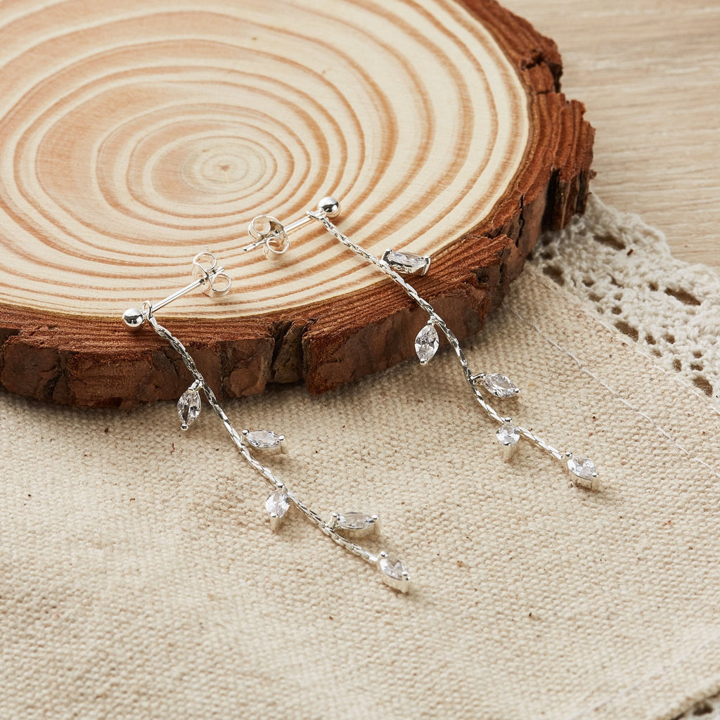 Silver Plated Leaf Dangle Earrings Created with Zircondia® Crystals