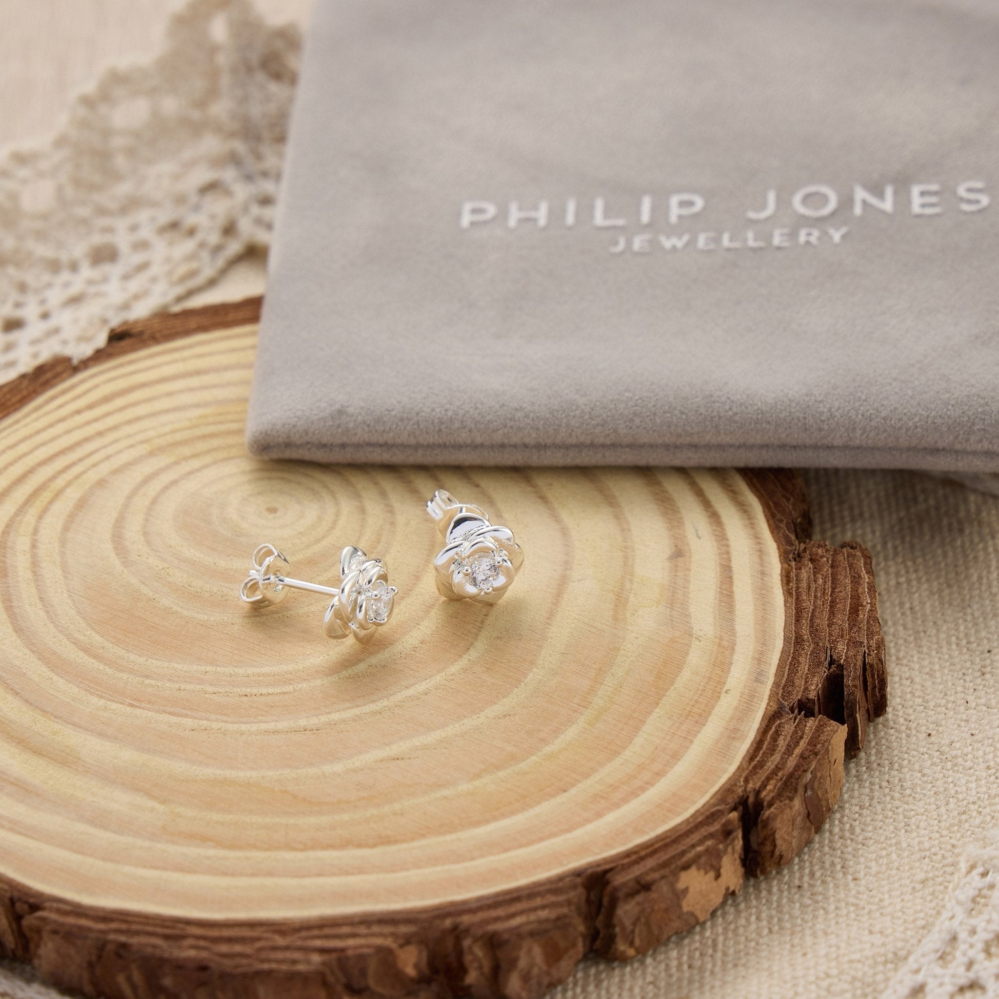 Silver Plated Rose Earrings Created with Zircondia® Crystals